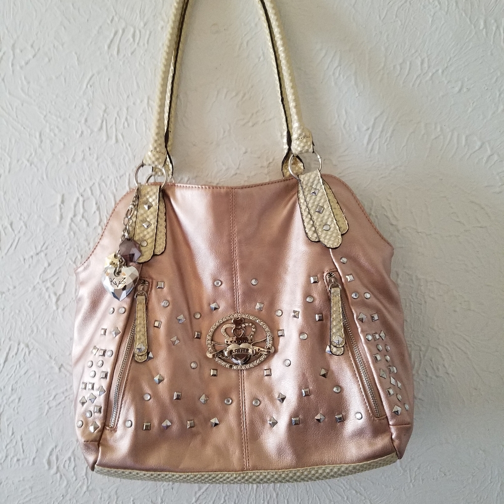 Kathy Van Zeeland coral metallic purse